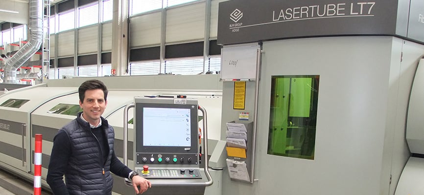 Fabian Steinbacher, Managing Director of KTM Components alongside the Lasertube LT7 machine